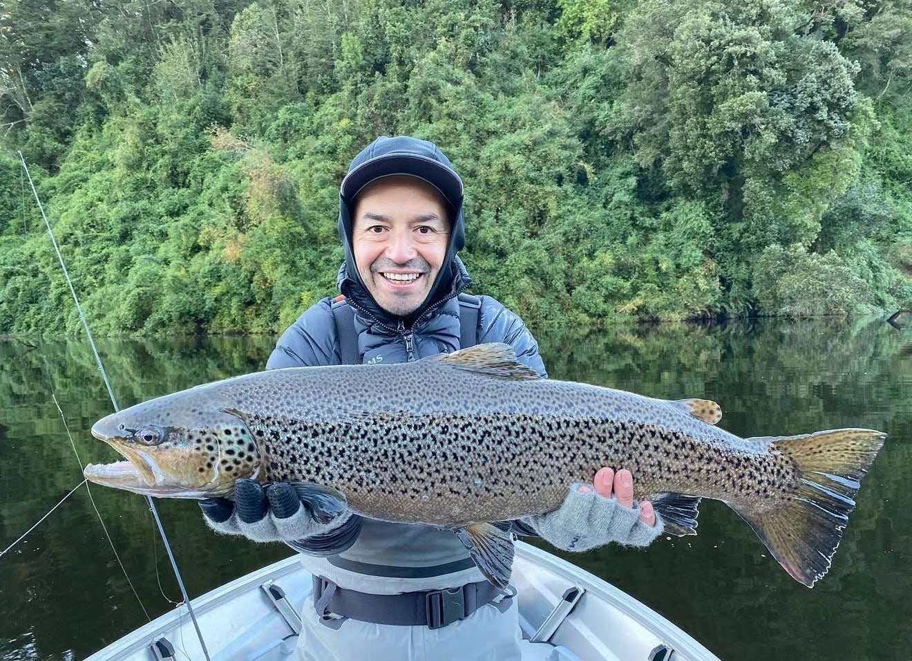 Angler with a large catch during a private River Trout excursion