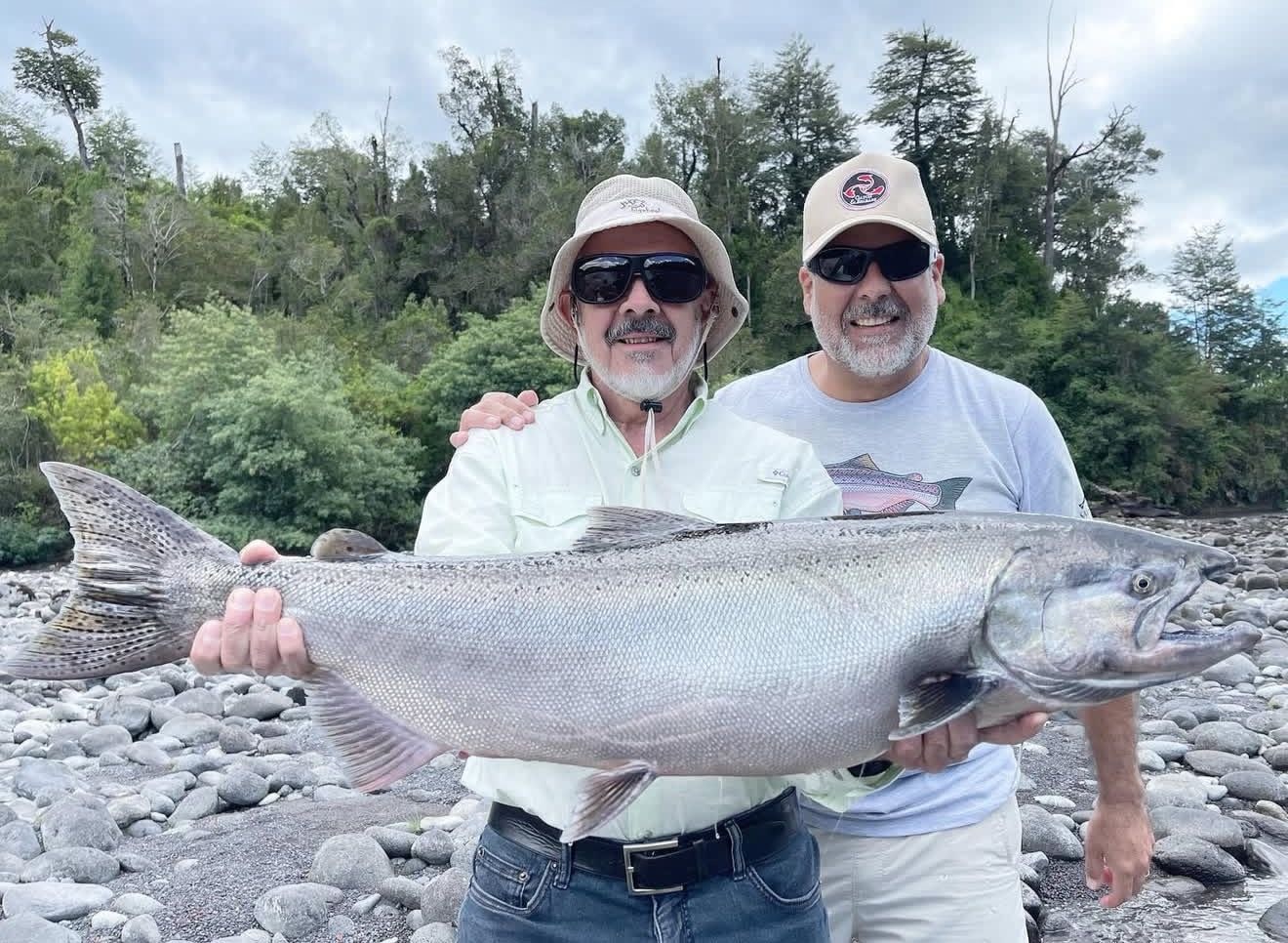 Two anglers with a large catch on a private excursion